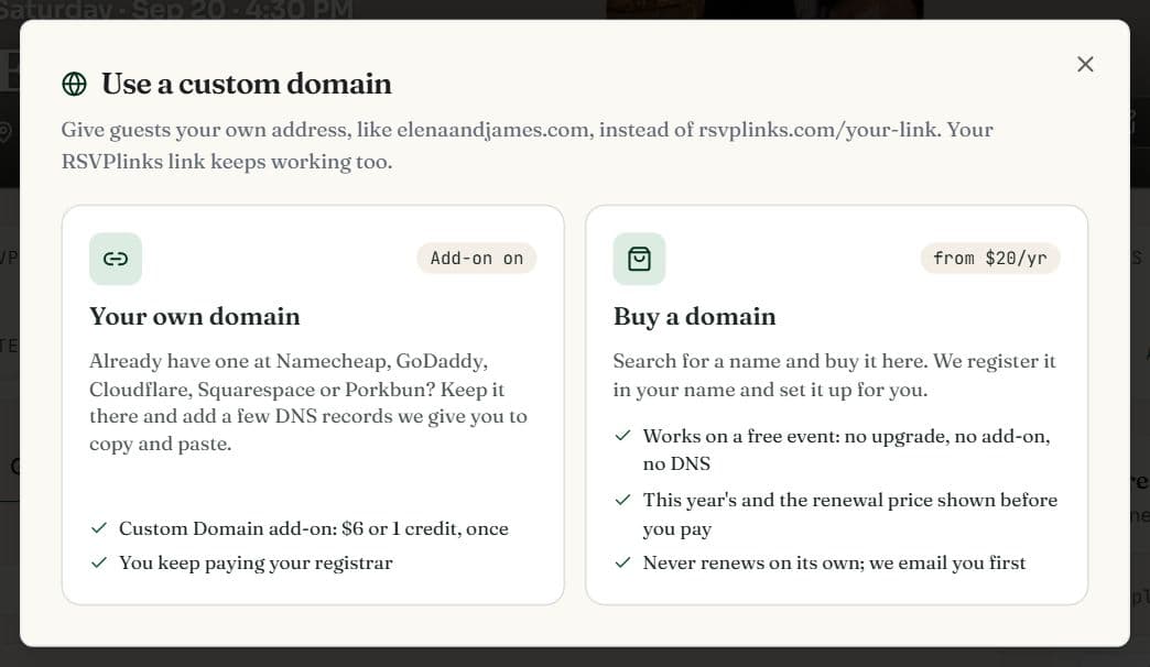 The Use a custom domain dialog with two choices side by side: Your own domain and Buy a domain, each with its price and what it includes